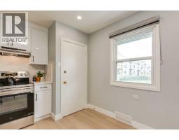 Family room - 1051 8 Avenue Ne, Calgary, AB T2E1X3 Photo 13