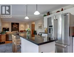 Family room - 311 Douglasbank Green Se, Calgary, AB T2Z1V7 Photo 10