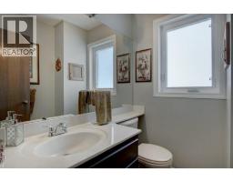 Family room - 311 Douglasbank Green Se, Calgary, AB T2Z1V7 Photo 14