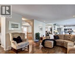 Living room - 311 Douglasbank Green Se, Calgary, AB T2Z1V7 Photo 12