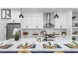 Laundry room - 421 Hendon Drive Nw, Calgary, AB T2K2A1 Photo 8