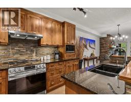 218, 106 Stewart Creek Landing, Canmore, AB T1W0G6 Photo 13