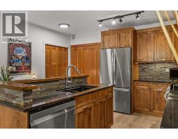 218, 106 Stewart Creek Landing, Canmore, AB T1W0G6 Photo 12