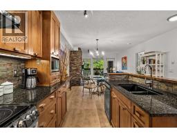 218, 106 Stewart Creek Landing, Canmore, AB T1W0G6 Photo 14