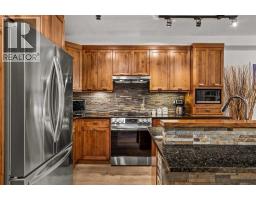 Kitchen - 218, 106 Stewart Creek Landing, Canmore, AB T1W0G6 Photo 7