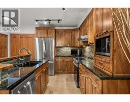 218, 106 Stewart Creek Landing, Canmore, AB T1W0G6 Photo 11