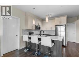 Living room - 220, 8 Sage Hill Terrace Nw, Calgary, AB T3R0W5 Photo 7