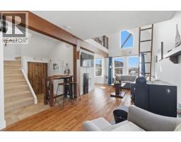 212 Cottageclub Crescent, Rural Rocky View County, AB T2K1B3 Photo 17