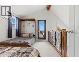 212 Cottageclub Crescent, Rural Rocky View County, AB T2K1B3 Photo 22