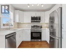 212 Cottageclub Crescent, Rural Rocky View County, AB T2K1B3 Photo 14