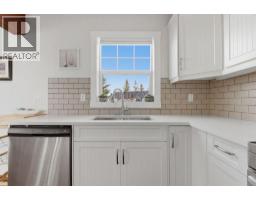 212 Cottageclub Crescent, Rural Rocky View County, AB T2K1B3 Photo 15