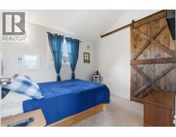 212 Cottageclub Crescent, Rural Rocky View County, AB T2K1B3 Photo 18
