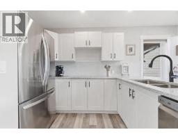 212 Cottageclub Crescent, Rural Rocky View County, AB T2K1B3 Photo 28