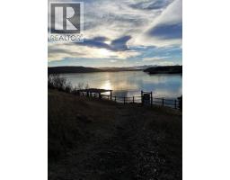 212 Cottageclub Crescent, Rural Rocky View County, AB T2K1B3 Photo 35