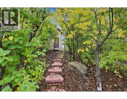 31 Montenaro Bay, Cochrane Lake, AB T4C0A5 Photo 42