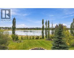 31 Montenaro Bay, Cochrane Lake, AB T4C0A5 Photo 43