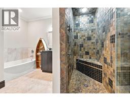 31 Montenaro Bay, Cochrane Lake, AB T4C0A5 Photo 40