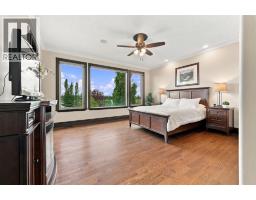 31 Montenaro Bay, Cochrane Lake, AB T4C0A5 Photo 25