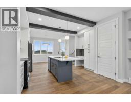 242 Southbow Avenue, Cochrane, AB T4C3R1 Photo 11