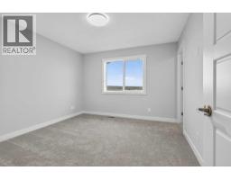 242 Southbow Avenue, Cochrane, AB T4C3R1 Photo 25