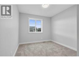 242 Southbow Avenue, Cochrane, AB T4C3R1 Photo 36