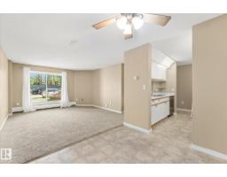Laundry room - #104 2508 50 St Nw, Edmonton, AB T6L6X9 Photo 6