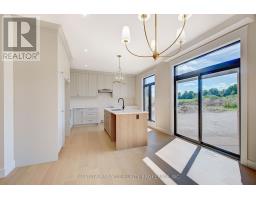77 Basil Crescent, Middlesex Centre, ON N0M2A0 Photo 13