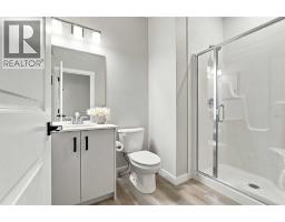 Laundry room - 70 Creekside Avenue Sw, Calgary, AB T2X4A9 Photo 15