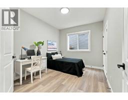 Bedroom - 70 Creekside Avenue Sw, Calgary, AB T2X4A9 Photo 13