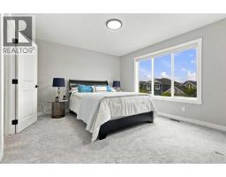 Furnace - 70 Creekside Avenue Sw, Calgary, AB T2X4A9 Photo 23