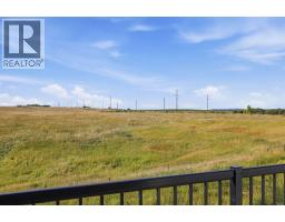 1602 Jumping Pound Common, Cochrane, AB T4C2L1 Photo 17