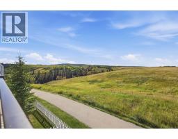 1602 Jumping Pound Common, Cochrane, AB T4C2L1 Photo 18