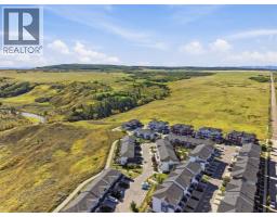 1602 Jumping Pound Common, Cochrane, AB T4C2L1 Photo 46