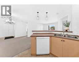 Bedroom - 1316, 505 Railway Street W, Cochrane, AB T4C2K9 Photo 7