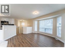 Living room - 206 Saratoga Close Ne, Calgary, AB T1Y7A1 Photo 6