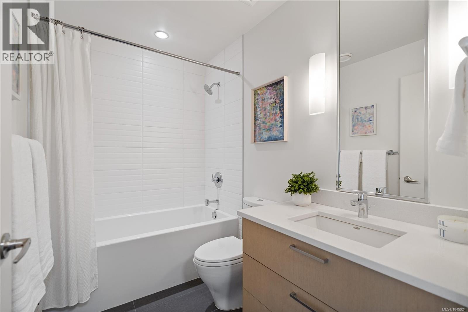 #101 3916 Carey Rd - Image 34