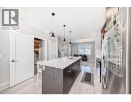 Laundry room - 120 Chelsea Drive, Chestermere, AB T1X1Z3 Photo 10