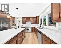 Family room - 3 Pumpmeadow Crescent Sw, Calgary, AB T2V5C8 Photo 6