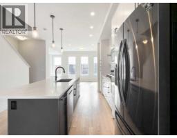 Primary Bedroom - 204, 81 Greenbriar Place Nw, Calgary, AB T3B6J1 Photo 7