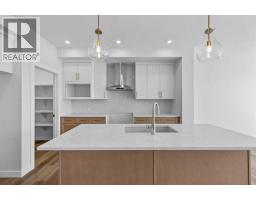 Kitchen - 149 Creekside Street Sw, Calgary, AB T2X6H9 Photo 11