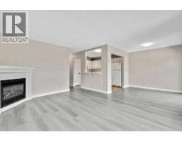 Living room/Dining room - 5 Templemont Road Ne, Calgary, AB T1Y5A2 Photo 10