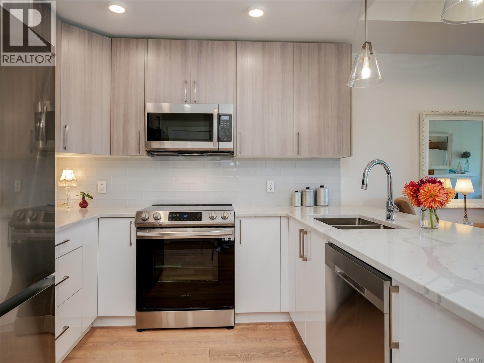 #308 7098 Wallace Dr - Image 5