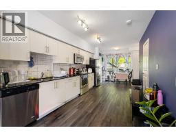 Primary Bedroom - 106, 1740 9 Street Nw, Calgary, AB T2M4Z5 Photo 6