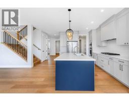Living room - 463 Rivercrest View, Cochrane, AB T4C3C7 Photo 6