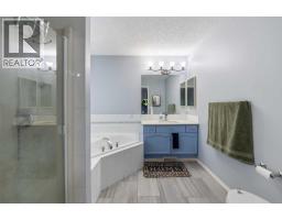 Bedroom - 148 Springmere Way, Chestermere, AB T1X1P1 Photo 11