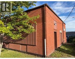 back of building, exit doors