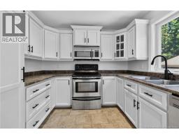 Living room - 124 Rouse Street, Dieppe, NB E1A0W1 Photo 14