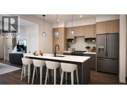 Laundry room - 7158 Rangeview Avenue Se, Calgary, AB T3S0S5 Photo 9