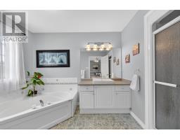 Laundry room - 23 Mcfadden Drive, Springwater, ON L0L1V0 Photo 9