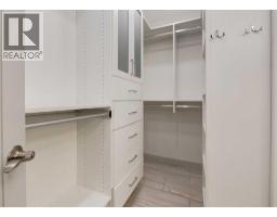 871 Oakside Circle Sw, Calgary, AB T2V4P6 Photo 27